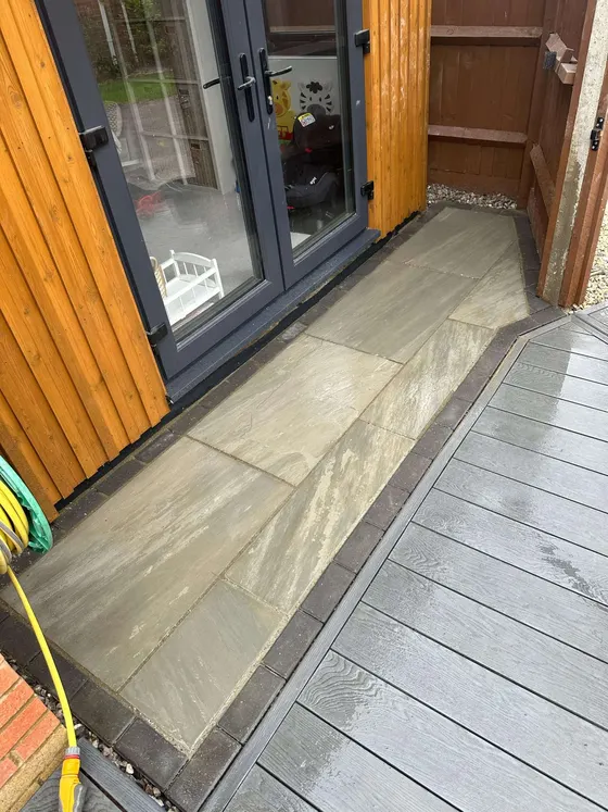 Decking outside timber-clad garden doors