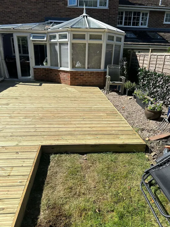 New decking built out from a conservatory
