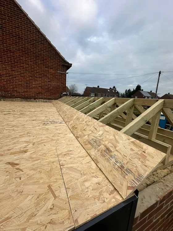 Flat roof decking on a single-storey extension
