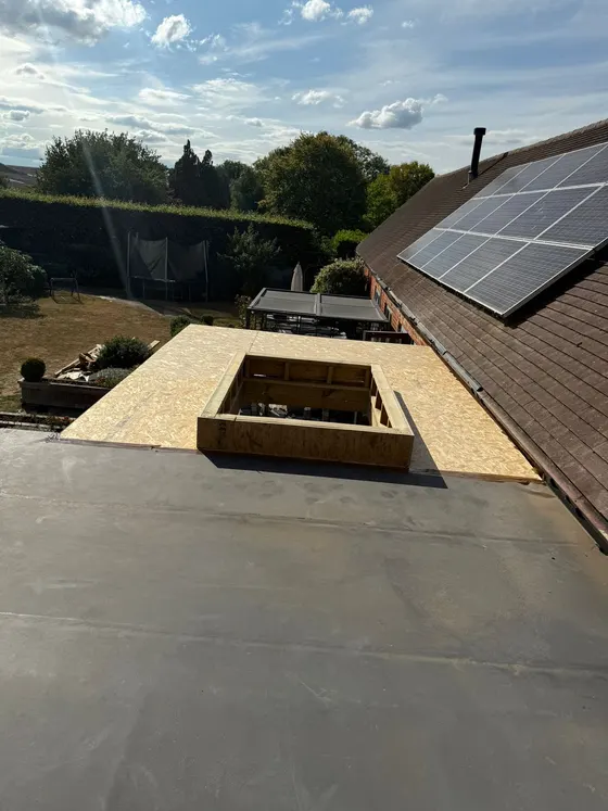 Finished flat roof with rooflight kerb