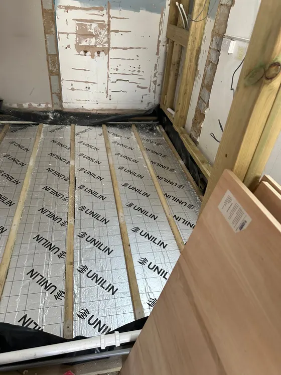 Insulation boards going down under a new floor