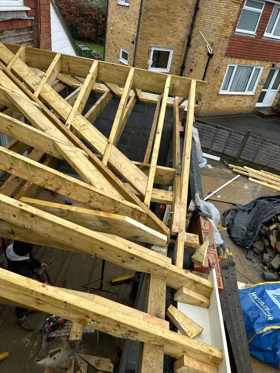 Hip roof being framed