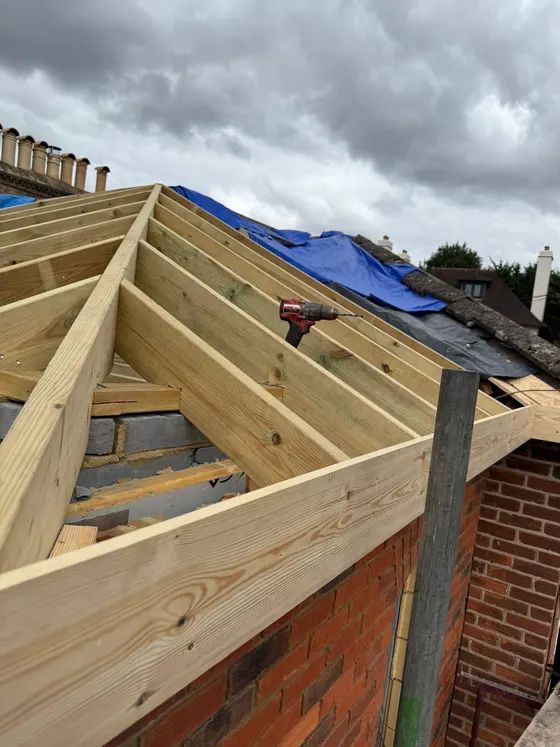 Hipped roof frame going up on an extension