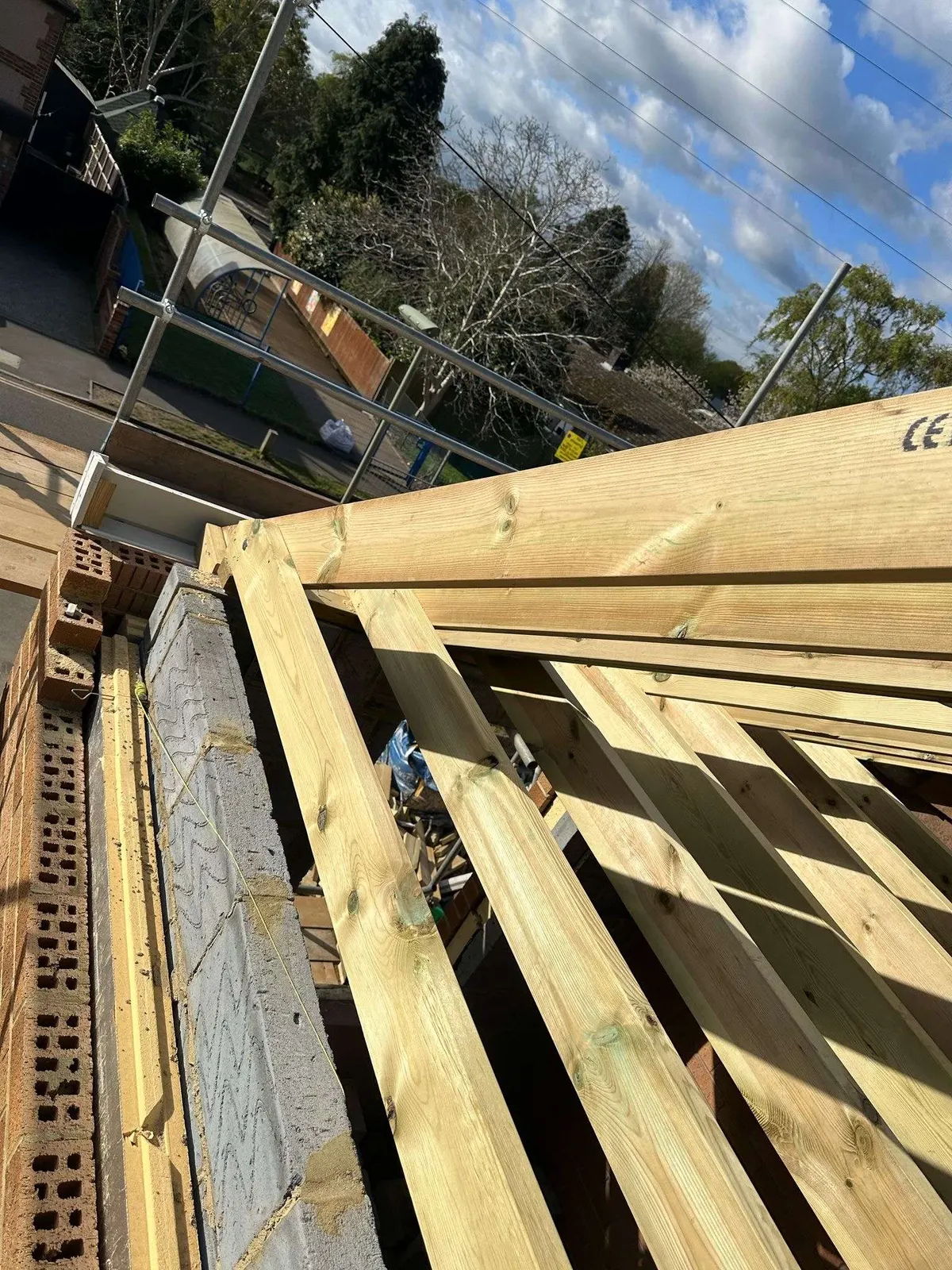 Rafters cut and fixed over new blockwork